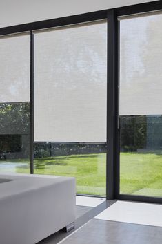 a living room with large sliding glass doors