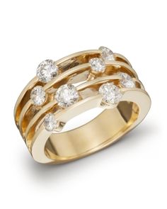 This contemporary yellow gold ring splits into four bands accented with vibrant diamonds. Wide Band Diamond Rings, Crossover Diamond Ring, Diamond Rings Design, Custom Ring Designs, Rhinestone Ring, Popular Jewelry, Exclusive Jewelry, Diamond Band, Rose Gold Engagement Ring