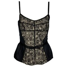 D&G by DOLCE & GABBANA dress top comes in a black lace rayon featuring a bustier style, bow detail, and back zip up closure. Very Good Pre-Owned Condition. Marked: 44 Measurements: Bust: 30 inches Length: 13.5 inches Reference: 116781 Category: Dress Top More Details Brand: D&G by DOLCE & GABBANA Size: 8 Color: Black Color 2: White Fabric: Polyamide Bend Pattern: Lace Style: Bustier Age Group: Adult Gender: Female Lace Bustier Dress, Top In Pizzo, Wool Knitted Dress, Slim Aarons, Dolce Gabbana Dress, Shopping Photography, Bill Blass, Lace Bustier, Gio Ponti