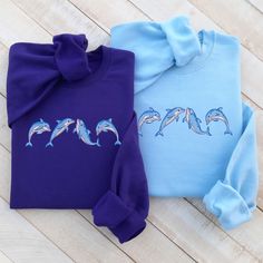 Really soft and comfortable unisex embroidered sweatshirt crewneck with cute dolphins embroidered on it made of high quality! Classic fit, 50/50 cotton/polyester. Each sweatshirts is made in the size and color of your choice, with a unique design. I suggest you use your usual size for a better fit or choose a size for a looser fit.   Sweatshirts in unisex style with unique design the perfect gift for your best friend, loved one or your new favorite crewneck sweatshirt for autumn, winter, spring Cute Dolphins, Dolphin Lover, Animal Sweatshirt, Sea Animal, Sweatshirt Cute, Sweatshirt Crewneck, Embroidered Sweatshirt, Embroidered Sweatshirts, Unisex Style