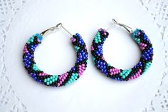 "Beaded hoop earrings! They will be a wonderful accessory for any of your style! READY TO SHIP! The diametrs are: 1.5\" (3.8 cm) 1.7 \" (4.3 сm) 1.9 \" (4.8 cm) 2.2 \" (5.5 cm) ❤ CUSTOM ORDERS It is ABSOLUTELY HANDMADE . So if you like this item in a different color or size, send me a message please. I will send you a link for a \"custom order\" and you'll be able to place the order there. Please feel free to communicate with me. SHIPPING Item will be shipped carefully packed in a GIFT BAG!! Shi Trendy Small Hoop Beaded Earrings, Trendy Round Beaded Earrings, Trendy Handmade Round Hoop Earrings, Trendy Handmade Hoop Beaded Earrings, Trendy Handmade Beaded Earrings, Earrings Turquoise, Purple Violet, Mint Blue, Colorful Earrings