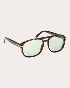 Made in Italy, these Tom Ford sunglasses detail their patterned navigator frames with an iconic double bridge, signature logo detailing and total light-blocking lenses. Frames: 100% acetate Lenses: 100% UV protection Wipe with soft cloth Made in Italy Measurements Lens width: 58mm Bridge width: 16mm Temple length: 140mm | Tom Ford Women's Shiny Classic Havana & Green Eco T-Logo Navigator Sunglasses Stylish Glasses For Men, Trendy Glasses, Sincerely Jules, Stylish Glasses, Tom Ford Sunglasses, Mens Glasses, Signature Logo, Tom Ford, Havana