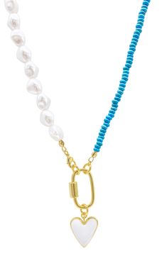 A 50/50 freshwater pearl and turquoise stone bead necklace holds a polished enameled heart, adding a colorful finish to your everyday style. 18" length, 1" pendant Carabiner clasp 14K gold plated brass, freshwater pearl, stone bead, enamel Imported Turquoise Jewelry With Pearl Chain And Round Beads, Turquoise Beaded Necklace With Pearl Charm As Gift, Blue Pearl Necklace With Charm For Jewelry Making, Gift Turquoise Beaded Necklace With Pearl Chain, Turquoise Pearl Necklace With Pearl Charm As Gift, Turquoise Beaded Necklaces With Pearl Chain As Gift, Turquoise Necklaces With Pearl Chain And Round Beads, Gift Turquoise Necklaces With Pearl Chain, Turquoise Necklace With Pearl Chain And Round Beads