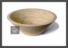 a stone bowl is shown with a black frame on the wall behind it and an ad for argo's