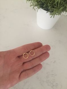 "Minimalist 14K gold stud earring set or rose gold stud set. Your set includes 2 pairs of stud earring - solid circle & open circle studs. These dainty stud earrings will quickly become your favorites, and are perfect for everyday wear! Details: 14K gold / rose gold plated - Lead & Nickel free Delicately hand crafted with brushed gold plated metal findings & earring posts Closed circles measure approx 0.33\" & the open circles measure approx 0.45\" All Pondering Persimmon jewelry Gold Plated Minimalist Round Cartilage Earrings, Minimalist Gold Plated Huggie Earrings, Minimalist Gold-plated Cartilage Earrings, Minimalist Gold-plated Huggie Earrings, Minimalist Gold Plated Circle Earrings, Rose Gold Round Cartilage Earrings For Everyday, Minimalist Gold-plated Circle Earrings, Minimalist Gold Plated Drop Cartilage Earrings, Gold Minimalist Cartilage Earrings For Everyday