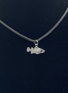 Swimming fish. Small, Light, beautiful, and easy to carry, this piece is perfect for any occasion. Jewelry for lovers of the sea. This is a unique work done all by the sea passionate artist, design, production, and finish.  This pendant is included with a black waxed cord necklace(18). **Note: Pictures are enlarged to show detail. All pendants are packaged and shipped in a cotton baggy inside a water and tear-resistant bubble wrap envelope. If you have any questions about this item or any other items listed in our shop please do not hesitate to contact us.** Made out of .925 Sterling Silver. Completely solid, light, and double-sided. Recommend for adults and teens. MADE IN USA Copyright belonging to Lluch Art Design. Funky Jewelry Necklaces, Ender Man, Snapper Fish, 3d Pendant, Soldered Pendants, Swimming Fish, Fish Jewelry, Fish Necklace, Note Pictures