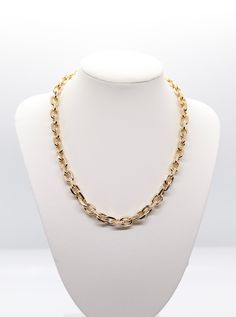 This gold chain link necklace is a beautiful and elegant piece of jewelry that will add a touch of class to any outfit. The gold is a rich color that complements any skin tone, and the links are a delicate size that will not overpower your neck. The necklace is adjustable, so you can customize the length to suit your personal style. Formal Long Necklace With Clavicle Chain, Classic Party Chain Necklace, Classic Formal Choker Necklace, Formal Clavicle Chain Necklace, Classic Choker Necklace For Formal Occasions, Chic Oval Metal Jewelry, Elegant Oval Link Chain Toggle Necklace, Classic Gold-tone Clavicle Chain Necklace, Elegant Toggle Necklace With Oval Link Chain