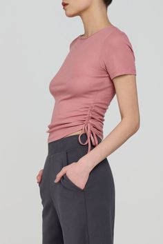 Turn heads in this gorgeous Harmony Short Sleeve Top. This top is made with Eco-friend ecovero fabric that meet the highest environmental standards. This top features drawstrings on both ends near the waistline allowing you to adjust the fit to your liking. Product Features: FIT: this short sleeve top features a flattering fit with a comfortable drawstring detail on both sides of the waist allowing you to adjust to your liking. FEATURES: This t-shirt features drawstrings on both sides of the wait for an adjustable fit. The drawstrings also create a unique look and make this t-shirt a great choice for any casual occasion. It is made from a soft, lightweight fabric that is comfortable to wear. 98% Ecovero, 2% spandex Short sleeve T-Shirt WHEN TO WEAR: wear it shopping to and from work outs, Drawstring Detail, Gilet Long, Bra Dress, Work Outs, Spandex Shorts, Midnight Navy, Cargo Pant, T Shirt Bra, Short Sleeve Top