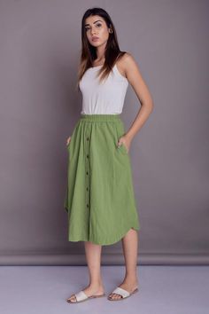 Button Down Apple Cut Linen Skirt, Midi Linen Skirt, Front button skirt, Buttoned skirt with pockets - Custom made by Modernmoveboutique>DESCRIPTION<- Length of the skirt - 28" (71 cm) - If you want to customize the length, please mention in 'Note to seller' section while ordering the skirt.- standard fit.- made from Linen blend. The fabric is of medium weight (185 g).- the model is 172 cm high (regular XS - S) and is wearing size S. - color in the picture - PALE GREEN - (Please choose col Cotton Mini Skirt In Solid Color, Solid Color Cotton Mini Skirt, Cotton Mini Skirt Solid Color, Green Button-up Bottoms, Casual Maxi Skirt With Button Closure For Summer, Knee-length Summer Skirt With Button Closure, Summer Knee-length Skirt With Button Closure, High-waisted Buttoned Maxi Skirt For Summer, Cotton Mini Skirt With Button Closure