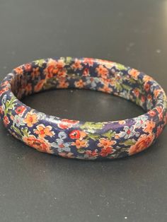 Vintage Chinese Oriental Wooden Hand Painted Lacquer blue pink Bangle Bracelet  Floral flowers gilt gold detailing for boho festival Blue Bangle Bracelet For Festivals, Blue Bangle Bracelets For Festival, Bohemian Bracelets For Spring, Blue Bracelets For Festivals, Blue Bohemian Bracelets For Festivals, Bohemian Blue Bracelet For Festivals, Bohemian Blue Bracelets For Festivals, Blue Bohemian Flower Bracelets, Bohemian Blue Flower Bracelets