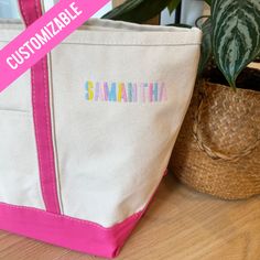 These canvas tote bags with zipper are exactly what you are looking for this years tote! This personalized embroidered tote bag and bridesmaid bag is your go to summer bag whether it be for the ride along, beach or day at the park! Embroider with a name of your choice! - Details -- This listing is for 1 tote bag - Font color in thread of your choice-Top Zip Closure.- Quality canvas handles- 18 oz canvas with sturdier seams that allows tote to stand on its own.- One outer pocket with an open top Personalized Cotton Canvas Travel Bag, Personalized Cotton Canvas Bag For Travel, Summer Rectangular Bag With Embroidered Logo, Customizable Cotton Canvas Bag For Travel, Personalized Eco-friendly Canvas Travel Bag, Eco-friendly Personalized Canvas Bag For Travel, Eco-friendly Personalized Canvas Travel Bag, Summer Canvas Bag For School, Summer School Canvas Bag