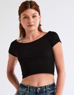 Tilly's Off The Shoulder Tee. Off The Shoulder Neckline. Short Sleeve. Solid Color. Cropped Length. 95% Cotton, 5% Spandex. Machine Wash. Imported. Model Is Wearing A Size Medium. Model Measurements:height: 5'7" Bust: 34.5"waist: 27"hips: 38" | Tillys Off The Shoulder Tee Long Tube Top, Wwe T Shirts, Off The Shoulder Tee, Flannel Sweatshirt, Girls Graphic Tee, Girls Blouse, Open Knit Sweater, Tee Outfit, Swimsuit Cover Ups