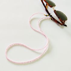 Pink beaded glasses chain, Sunglasses pink cord, Eyewear holder, Sunglasses necklace, Pink glasses holder, Sunglasses strap, Eyeglasses cord Beautiful fashion trend sunglasses beaded string This sunglass strap is lightweight, comfortable to wear and secures your sunglasses on your neck. Fashion trend accessory for the summer! Total length is 70cm / 27.7 inches. Beautifully packaged and ready for gift giving. JEWELRY CARE: Please take care of your jewelry do not wear in the shower, swimming pool, Adjustable Pink Necklaces For Fashion Accessory, Trendy Pink Glass Jewelry, Handmade Adjustable Pink Glasses Chains, Adjustable Pink Glasses Chains As Gift, Adjustable Pink Beaded Glasses Chain, Adjustable Pink Glass Glasses Chains, Pink Adjustable Glasses Chains As Gift, Handmade Pink Glasses Chains For Summer, Pink Adjustable Glasses Chains For Gift