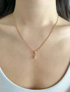 Our dainty link chain necklaces are made out of stainless steel and plated with 18k gold. Not only is stainless steel hypoallergenic, it's also highly durable with water resistant and tarnish resistant abilities!  💎 MATERIAL DETAILS ○ Link Chain: 18k Gold Plated Stainless Steel, Lobster Clasp ○ Pendant: 18k Gold Plated, Cubic Zirconia 💯 QUALITY & CRAFTSMANSHIP ○ Materials are handpicked, inspected, and handled with the utmost quality and care ○ Handcrafted with ♡ from our studio in Toronto, Ca Trending Chains For Women, Teardrop Pendant Necklace, Gold Plated Teardrop Drop Necklace In Elegant Style, Gold Plated Teardrop Necklace For Wedding, Teardrop Gold Plated Necklace For Wedding, Elegant Teardrop Gold Plated Drop Necklace, Elegant Drop Necklace With Tarnish Resistance, Elegant Drop Necklaces With Tarnish Resistant, Elegant Gold Plated Teardrop Pendant Necklace