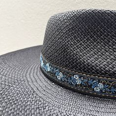 An elegant and highly versatile fashion statement, the Zoé straw fedora is designed with a teardrop crown and a large upturned brim, perfect for sun protection. Its versatility allows you to adjust the brim to your taste; up and curled up or down! It also features an adjustable sweatband to suit a variety of head sizes. Tall crown: 10cm | 3.94" Large brim: 12 cm | 4.72" Color: black UPF 50+ Handwoven in Ecuador Adjustable inner sweat band for added custom fit Structured Crown Panama Hat For Spring Vacation, Summer Vacation Hats With Structured Crown, Toquilla Straw Hat With Structured Crown For Vacation, Adjustable Toquilla Straw Sun Hat With Structured Crown, Panama Hat With Structured Crown For Beach And Spring, Vacation Straw Hat With Structured Crown, Spring Vacation Sun Hat With Structured Crown, Kentucky Derby Straw Hat With Structured Crown, Structured Crown Summer Hat For Vacation