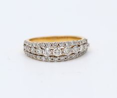 three row diamond ring on white background