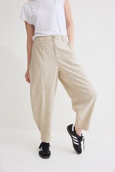 The devil is in the details. These tapered pants have a relaxed fit. Made with our iconic Core nylon fabric, these pants feel like loungewear. Tapered leg Belt loops 2 side pockets Vertical seams Trendy Tapered Bottoms For Spring, Modern Bottoms With Welt Pockets For Spring, Modern Tapered Pants For Fall, Modern Relaxed Fit High-waisted Dress Pants, Chic Relaxed Fit Tapered Leg Dress Pants, Modern Tapered Leg Bottoms For Spring, Spring Tapered Beige Pants, Modern Tapered Wide Leg Pants, Modern Tapered Wide-leg Pants