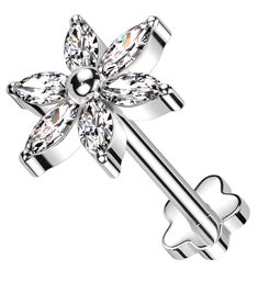 a flower shaped piercing with crystal stones on the top and an attached barbell ring