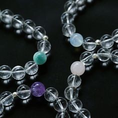 This bracelet features mesmerizing white crystal beads, each carefully selected for their clarity and luster, and the stretch design is comfortable and easy to wear, ensuring a perfect fit for any wrist size, whether worn alone for a minimalist look, or Stack with other bracelets for a more dramatic effect Gemstone:White Crystal,Pink Crystal,Amethyst,Green Cat Eye,Aquamarine Gemstone Dimensions:10mm Length:Small 13-14cm,Large 15-16cm Weight:22g-23g Clear Crystal Bracelet With Round Faceted Beads, Adjustable Clear Round Bead Crystals, White Stretch Bracelet With Faceted Beads For Healing, Crystal Bracelet With Round Beads For Meditation, Clear Crystal Bracelet With 8mm Round Beads, Clear Crystal Bracelet With 8mm Beads, Elegant Crystal Bracelet With Clear Round Beads, Everyday White Crystal Bracelet With Faceted Beads, Clear Spiritual Beaded Bracelets