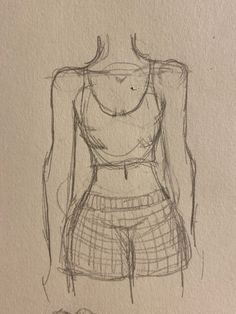 a drawing of a woman's shirt and shorts