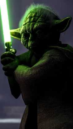 an animated yoda holding a green light saber