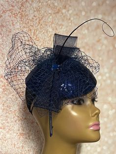 Navy Blue Sequins Sinamay fascinator. Accented with bows, hat pin and rhinestones. Perfect for church, tea parties, weddings, and special occasions. The hat affixes to the head by a hat elastic. Sizes 6 inches in diameter  7 inches in diameter 8 inches in diameter Handmade Gifts for mom, sister, wife, or yourself. PLEASE NOTE All items for Free Shipping will be shipped via USPS First Class Mail. Adjustable Gatsby Style Fascinator For Formal Occasions, Adjustable Blue Fascinator For Formal Occasions, Blue Adjustable Fascinator For Formal Occasions, Blue Adjustable Fascinator For Evening, Adjustable Blue Fascinator For Wedding, Blue Adjustable Fascinator For Wedding, Adjustable Royal Blue Hat For Formal Occasions, Royal Blue Mini Hats For Royal Ascot Evening, Royal Blue Adjustable Hat For Formal Occasions