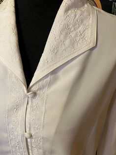 This is a rare gem and amazing condition. This is beautiful and clean and smoke-free. Measurements are approximately 21 inches  pit to pit flat 24 inches top to bottom. Thanks so much for looking. Have an amazing day. Embroidered Long Sleeve Formal Tops, Embroidered Long Sleeve Tops For Formal Occasions, Elegant Long Sleeve Embroidered Shirt, Long Sleeve Wedding Shirt For Spring, Classic Long Sleeve Embroidered Shirt, Fitted Formal Shirt With Floral Embroidery, Elegant Long Sleeve Shirt With Floral Embroidery, Formal Fitted Shirt With Floral Embroidery, Elegant Embroidered Formal Tops