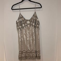 Nwt Aidan Mattox Sequin Neutral Colored Dress Mini, V Neck, Spaghetti Strap, Party, Sequin, Shiny, Formal, Metallic, Homecoming, A Line Beaded Dress Size 12 Color: Biscotti Comes With A Bag Of Sequins Made In India Comment If You Have Any Questions! Embellished V-neck Dress For Date Night, Summer Sequin Embellished Cocktail Dress, Summer Cocktail Sequin Embellished Dress, Summer Cocktail Embellished Sequin Dress, Fitted Sequin Dress With Beaded Straps For Summer, Embellished V-neck Sequin Dress For Date Night, Embellished Mini Sequin Dress For Date Night, Glamorous Sequin Dress With Beaded Straps For Summer, Glamorous Summer Sequin Dress With Beaded Straps