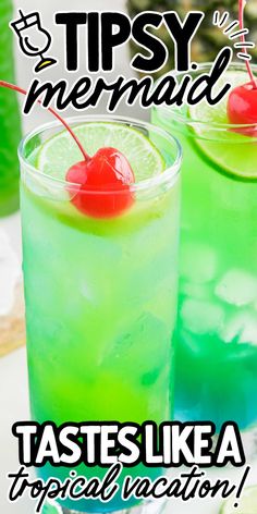 two glasses filled with green and red drinks on top of a white table next to each other