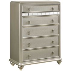 a silver dresser with drawers and knobs on the bottom drawer, in front of a white background