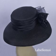 NEW EXCLUSIVE DESIGN Hat body is made of paper straw braid with crown band of satin& handmade organza flower Brim width is 11cm,not too big also not too small,just right size for many outfit Head size: 57cm also with satin ribbon to adjust it to be smaller The color is black,it is very classic color and it always looks good to match with many other colors Ideal for wedding/party/races/church It is sent by epacket which takes 5-10 days to United Kingdom,10-25 working days to most of other cou Elegant Spring Ribbon Fascinator, Summer Party Cloche Sun Hat, Spring Party Straw Boater Hat, Adjustable Fedora Straw Hat For Party, Black Straw Hat For Summer Party, Straw Brimmed Sun Hat For Party, Black Boater Hat For Summer Wedding, Black Summer Hat For Wedding, Party Fedora Hat In Straw