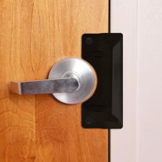 a door handle on a wooden door