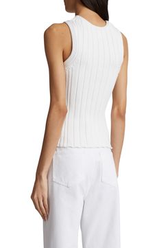 This tank-style sweater knit with dimensional wide-gauge ribbing from silk-kissed cotton-blend yarn is a transitional piece you'll reach for year-round. 23" length (size Medium) Crewneck Sleeveless, with cutaway shoulders 50% cotton, 28% polyamide, 22% silk Dry clean Made in Italy Designer Clothing Sleeveless Ribbed Top For Layering, Sleeveless Tops With Ribbing For Layering, Fitted Sleeveless Top With Ribbing, Chic Cotton Tank Top With Ribbed Neckline, Fitted Ribbed Vest For Layering, Fitted White Textured Knit Tank Top, Fitted Cotton Pointelle Knit Tank Top, Sleeveless Ribbed Cotton Knit Top, Fitted Sleeveless Textured Knit Top