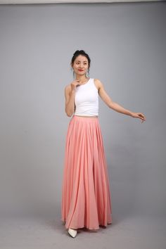 100 Colors Chiffon High Quality Orange Pink Long Party Skirt Evening Wedding Lightweight Summer Holiday Beach Bridesmaid Maxi Skirt Detail Info: ❤ Color: Orange Pink color as picture. More color choice is as follows, https://www.etsy.com/listing/213656440/chiffon-dress-color-card?ref=shop_home_feat_1 Please just note the color you want with order. ❤ Material: Chiffon Size: The length is from waist to bottom, please choose as you like. ❤ Care: machine wash cold and gentle, tumble low, line to dry Spring Pleated Maxi Skirt For Prom, Long Skirt For Summer Prom, Summer Prom Long Skirt, Summer Flared Skirt For Prom, Long Pleated Skirt For Summer Party, Spring Prom Flared Maxi Skirt, Summer Prom Tulle Skirt Bottoms, Summer Prom Full Skirt, Pink Summer Skirt For Prom