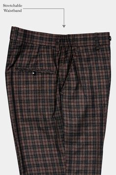 Elevate your ensemble with the Ferra Brown and Black Plaid Tweed Pant. The classic plaid pattern meets the rustic charm of tweed, adding depth and texture to your look. Whether it's a formal affair or a stylish gathering, this pant adds a touch of timeless sophistication that's sure to turn heads. Embrace a look that's both classic and distinguished. In addition to being constructed from Imported Superior Fabrics, French crown Pants are built with top quality components and thoughtful constructi Fall Tweed Trousers, Tailored Tweed Pants For Fall, Fall Fitted Tweed Pants, Formal Tweed Pants For Fall, Fitted Tweed Pants For Fall, Classic Tweed Bottoms For Fall, Tweed Bottoms For Business Casual In Fall, Fall Tweed Bottoms For Business Casual, Tailored Tweed Fall Bottoms