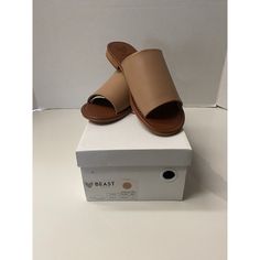 Elevate Your Casual And Travel Wardrobe With These Blush Brand Leather Slide Sandals. The Pinkish Beige Color Will Add A Touch Of Elegance To Your Summer, Fall, Or Spring Outfit. The Sandals Feature A Slip-On Closure, Flat Heel Style, And Synthetic Outsole Material For Comfort. The Leather Upper Material Is Durable And The Insole Is Also Made Of Leather For Added Comfort. These Sandals Are Perfect For Women Who Enjoy Solid Patterns And A B Shoe Width. Whether You Are Walking Around The City Or E Flat Heel Sandals For Beach In Medium Width, Flat Sandals For Beach With Medium Width, Flat Medium Width Sandals For Beach, Medium Width Flat Sandals For The Beach, Medium Width Flat Sandals For Beach, Chic Sandals For Beach, Leather Sandals With Flat Heel For Day Out, Trendy Medium Width Sandals For The Beach, Leather Sandals With Cushioned Footbed For Day Out