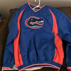 New With Tags University Of Florida Pull Over. Perfect Condition Collegiate Blue Outerwear For Game Day, Blue Long Sleeve Outerwear For Game Day, Blue Long Sleeve Windbreaker For College, Michigan Hoodie, Mens Windbreaker, Quarter Zip Jacket, Auburn University, Shirt Jackets, Pullover Windbreaker