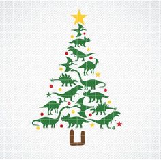 a christmas tree with dinosaurs around it