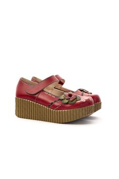 These stylish Soffia Leather Wedge Mary Janes are the perfect addition to any outfit. With their chic floral design and comfortable wedge heel, these shoes will make you stand out in both style and comfort. Step up your fashion game with these ruby-red leather mary janes. 2.16'' Heel Velcro closure. Genuine leather upper Leather lining Leather insole Leather midsole Rubber sole Mary Jane Wedges, Comfortable Wedges, Leather Mary Janes, Leather Wedges, Ruby Red, Wedge Heels, Step Up, Fashion Games, Mary Janes