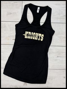 Wear this UCF Knights tank top to the next game or just show your support for the UCF Knights! Our tanks are made using 60% combed ringspun cotton & 40% lightweight polyester jersey. Child sizes available in full back tank upon request. If you're looking for an alternate style, please refer to our other listing below! Shirt care Please turn shirt inside out and wash in cold water using a mild detergent, gentle cycle. Do not use bleach as it can damage the artwork. Hang dry or low heat. Pleas Athleisure Tank Top For Sports Events, Stretch Racerback Tank Top For Sports Events, Sporty Cotton Racerback Muscle Tee, Cotton Scoop Neck Tank Top For Sports, Game Day Cotton Racerback Tank Top, Sporty Cotton Tank Top With Screen Print, Cotton Racerback Tank Top For Game Day, Sporty Racerback Tank Top For Sports Events, Stretch Racerback Tank Top With Letter Print