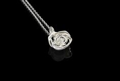 Elevate your outfit to a new level with silver-crafted rose pendant. The best gift for husband, lover and boyfriend. Shipping info. Silver production requires 15~17 business days. Please keep this in mind when purchasing. 1.Pendant info.[Width: 12mm] Material: Sterling Silver(High-gloss finish) Width: 12.44mm(0.48976378 inch) High With Loop: 18.63mm(0.73346457 inch) Loop Hole Size: 2.9 x 3.28mm(0.114173 x 0.1291339 inch) Weight: About 3.15 grams 2.Pendant info.[Width: 18mm] Material: Sterling Si Sterling Silver Rose Design Necklace For Weddings, Elegant Rose Sterling Silver Necklace, Elegant Rose Necklaces For Anniversary, Elegant Rose Detail Necklaces For Anniversary, Elegant Roses Necklaces For Anniversary, Formal Silver Jewelry With Rose Details, Rose Sterling Silver Necklace With Rose Design, Rose Sterling Silver Necklace For Anniversary, Sterling Silver Rose Necklace With Rose Design