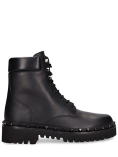 50mm Heel. Leather upper. Front lace-up closure. Studded details. Leather lining and insole. Rubber sole Leather Combat Boots, Ski Accessories, Heeled Loafers, Ski Wear, Manolo Blahnik, Boot Shoes Women, Valentino Garavani, Wedge Shoes, Black Boots