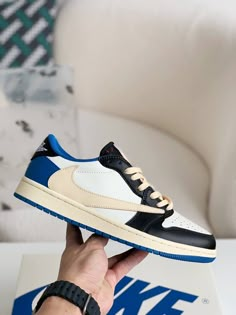 Capture the essence of hype and high fashion with these sneakers inspired by the coveted Travis Scott x Fragment x Air Jordan 1 Low. This design flawlessly blends iconic elements from both collaborators, featuring a classic colorway of white, blue, and sail, accented by the signature reverse Swoosh. Crafted with premium materials and meticulous attention to detail, these sneakers offer a look that's both timeless and trendsetting. Step into the spotlight and elevate your sneaker game with this m Fall Winter Jacket, Bottega Veneta Shoulder Bag, Loafer Sneakers, Sneaker Games, Air Jordan 1 Low, Jordan 1 Low, Travis Scott, Air Jordan 1, Sneaker Boots