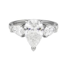 Graff 18K Platinum RingComes with original Box and Appraisal From GraffCentral Pear Cut Diamond: 2.42ctw (GIA certified) 2 Pear Cut Diamonds on the sides: 1.04ctw (GIA certified) Size: 6 SKU: ECJ02617 Luxury Pear-shaped Platinum Diamond Ring, Luxury Gia Certified Pear-shaped Rings, Luxury Pear-shaped Gia Certified Rings, Gia Certified Teardrop White Ring, Luxury White Pear-shaped Diamond Ring, Elegant Gia Certified Teardrop Diamond Ring, Luxury Gia Certified Pear-shaped Wedding Ring, Formal Gia Certified Teardrop Diamond Ring, Gia Certified Teardrop Diamond Ring For Formal Occasions