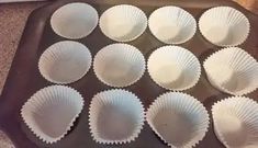 there are many cupcakes in the pan ready to be baked