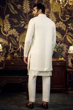 White silk front-open long bundi jacket with cutdana and thread embroidery. - Aza Fashions White Long Nehru Jacket With Resham Embroidery, Elegant Cotton Silk Nehru Jacket With Chikankari Embroidery, Elegant Nehru Jacket With Chikankari Embroidery In Cotton Silk, White Cotton Silk Nehru Jacket With Chikankari Embroidery, Traditional Long Nehru Jacket With Naqshi, Elegant Cotton Silk Nehru Jacket With Resham Embroidery, White Cotton Silk Nehru Jacket With Resham Embroidery, White Resham Embroidered Nehru Jacket In Cotton Silk, Elegant Cotton Silk Nehru Jacket For Festivals