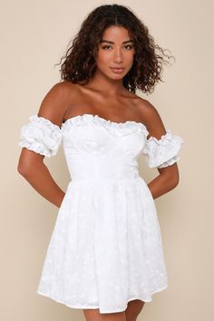 The picture-perfect summer day starts with the Lulus Sweet Viewpoint White Embroidered Off-the-Shoulder Mini Dress! Airy woven cotton boasts cute floral embroidery, as it shapes a ruffled, sweetheart neckline (with hidden no-slip strips) and an off-the-shoulder bodice with bustier-style cups, framed by elasticized puff sleeves. High, fitted waist sits atop a skater skirt that ends at a flirty mini hem. Hidden back zipper/clasp and smocking at back for fit. Fit: This garment fits true to size. Le Anniversary Dress, White Embroidered Dress, Green Mini Dress, Adhesive Bra, Ruffle Mini Dress, Puffed Sleeves Dress, Lulu Dresses, Mini Wrap Dress, Mini Shift Dress