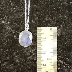 This stone helps deflect negativity away from your auric field, keeping your mind clear. It enhances your internal life force, bringing forth abundant joy, harmony and strength. Small but mighty, this dainty Rainbow Moonstone necklace is sure to sparkle the eyes of women and girls, no matter their age. Includes an 18” sterling silver chain Lead-free; nickel-safe Set in 925 sterling silver Pendant is approximately .59”H (15mm) x .40”W (10.4mm) Comes in our exclusive luxury gift box Source: Unknown Handmade natural stone - exact stone cut, color/rainbows and shape may vary. Product color may slightly vary due to photographic lighting sources! Disclaimer: Crystals should not be swallowed, given to children under the age of 3, or access to them given to pets. These statements have not been eva Oval Pendant Crystal Necklace With Gemstone For Gift, Crystal Necklace With Oval Gemstone Pendant For Gifts, Gift Crystal Necklace With Oval Gemstone Pendant, Gift Oval Pendant Crystal Necklace With Gemstone, Spiritual Moonstone Birthstone Necklace, Spiritual Silver Oval Pendant Gemstone, Spiritual Silver Gemstone With Oval Pendant, Spiritual Oval Pendant Crystal Necklace With Gemstone, Everyday Jewelry With Oval Natural Stones