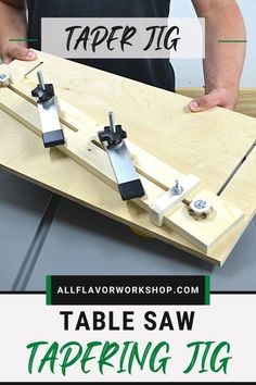 a person holding a table saw with the text taper jig on top of it