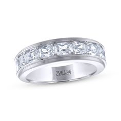 a white gold band with princess cut diamonds